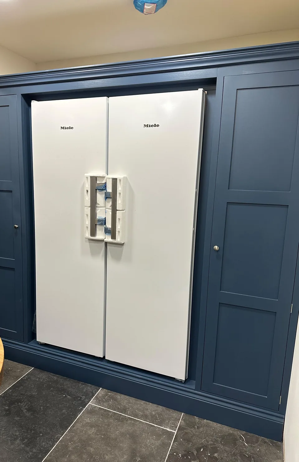 Byron Range larder cupboards built around an American fridge freezer
