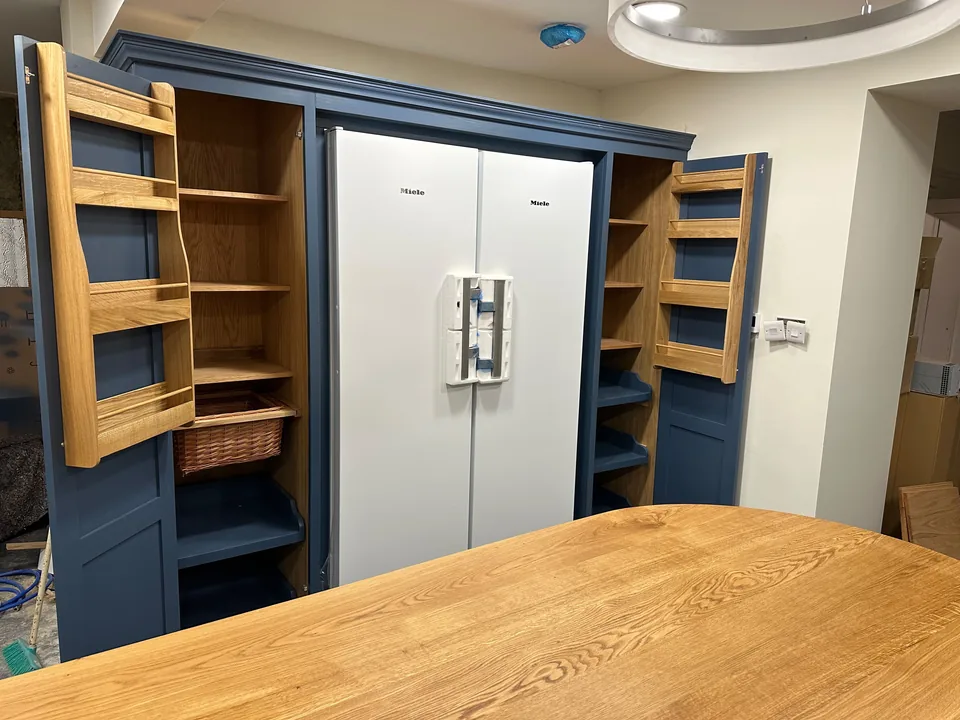 Byron Range larders open, with spice racks on the doors