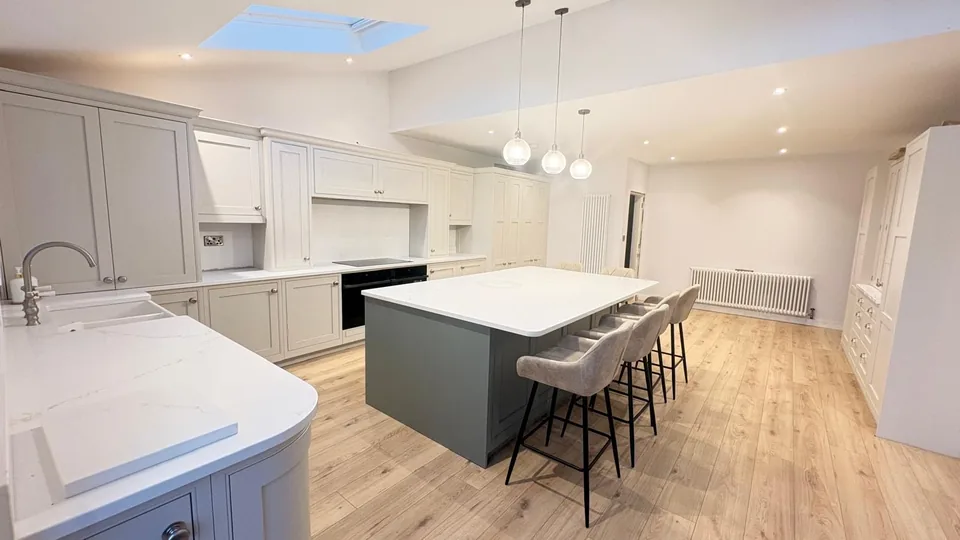Painted shaker kitchen with a large island