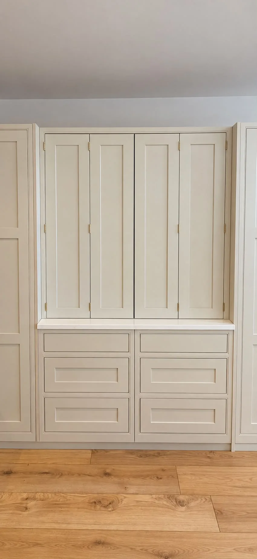 A Wordsworth Range dresser with folding doors over drawers