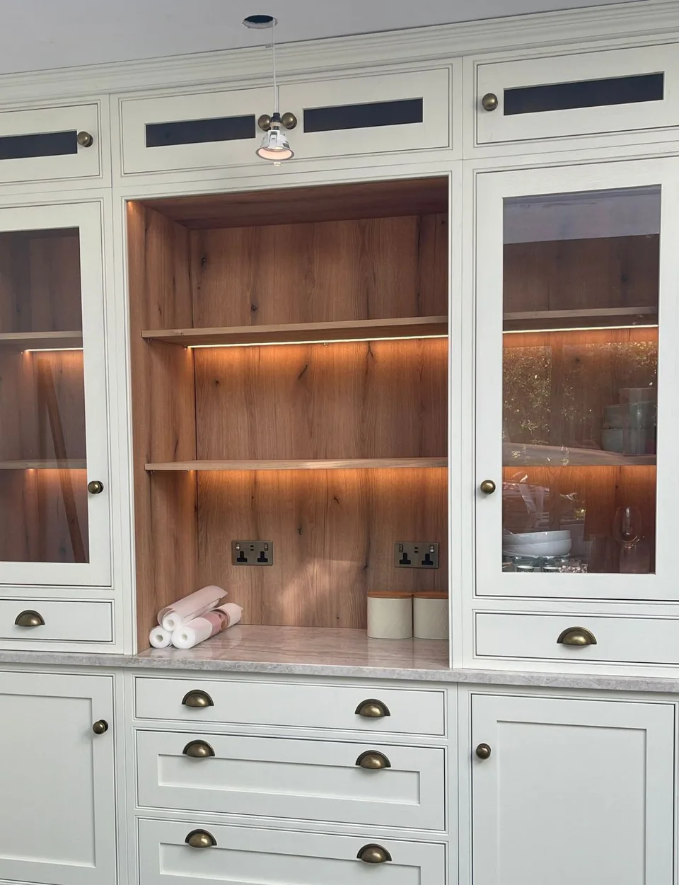 A Wordsworth Range dresser with glazed doors and lit open shelves