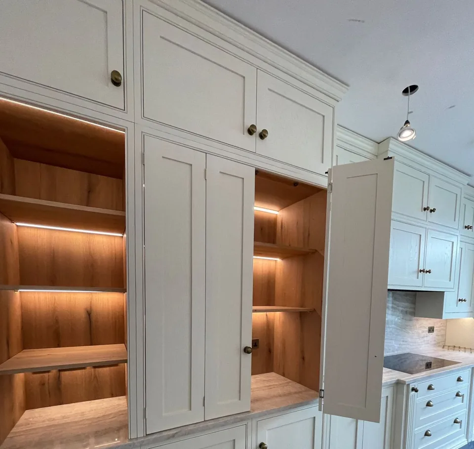 Wordsworth Range larder cupboards with lit shelves inside